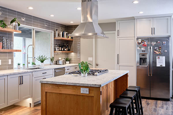 white kitchen with taupe tile backsplash